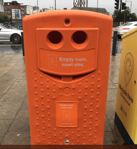 hubbubUK's tweet photo. What a smiley happy bin to brighten up a cold January afternoon! If you're warming up with a hot drink in #Leeds look out for the 5 orange bins to #recycle your #coffeecups and don't forget to pour out leftover coffee first. #LeedsByExample @ZeroWasteLeeds @LeedsCC_News https://t.co/WY3A30v0Rl