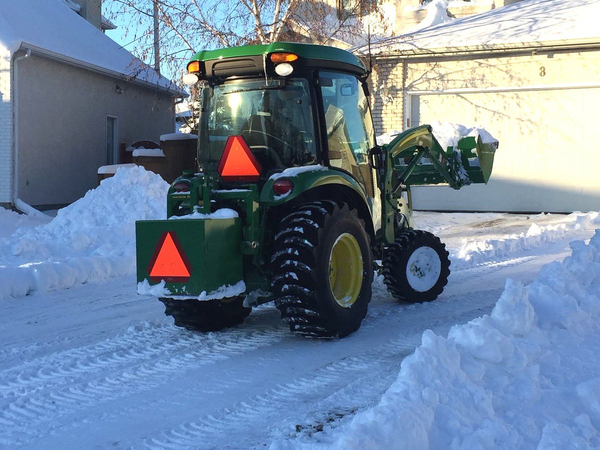 ennsbros's tweet photo. @JohnDeere to the rescue! ❄️❄️❄️
#conquerwinter #mbstorm https://t.co/LobnTiXhob