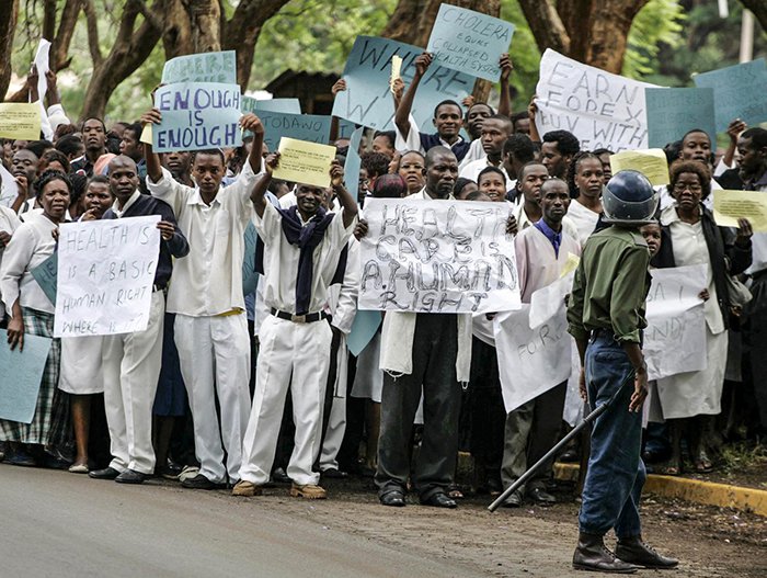 Image result for Zimbabwe fires 211 striking doctors"