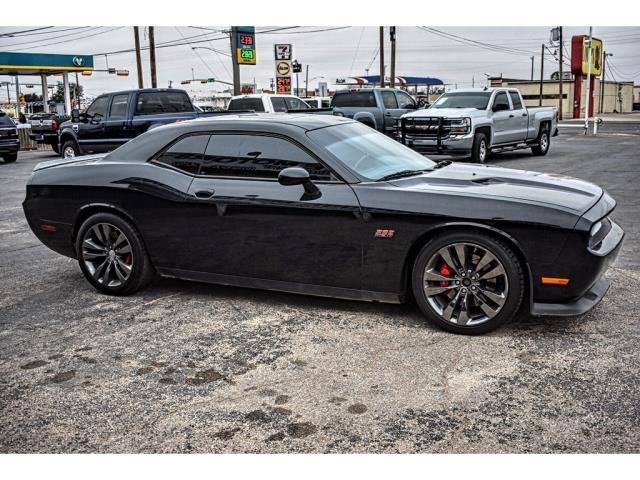 TexasEnterprise's tweet photo. You'll fall in love with the sharp red interior of this 2014 Dodge Challenger! Schedule your test drive today: https://t.co/KT1f8wSV1R https://t.co/uwulxk2I3a
