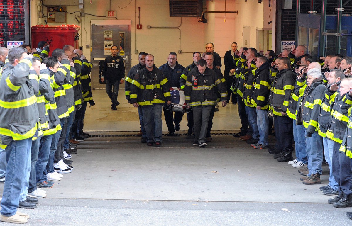FDNY's tweet photo. #FDNY members salute Firefighter Steven H. Pollard, #Ladder170, during his dignified transfer. Read more: https://t.co/e7YKsNVVr5 https://t.co/HK1oGa1br7