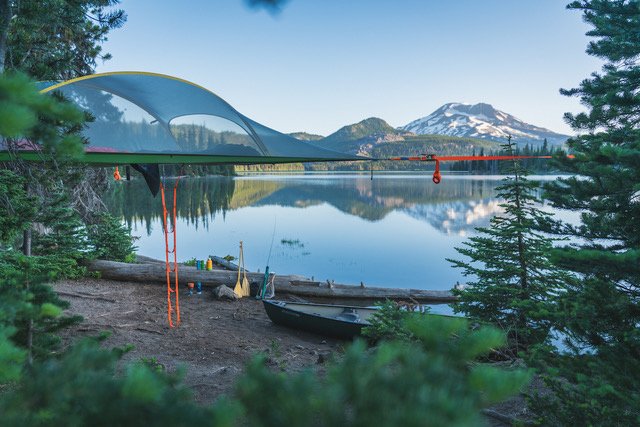 TentsElevated's tweet photo. Relax with a Stingray tree tent from Tentsile. What a view of snow capped mountains and glassy lake! 
Photo Credit: Nate Wyeth
#TentsElevated #INTENTSnation #getINTENTS #stingray #tentsile #treetent #snowcappedmountains #trees #lake #views #camping #relax #mountain #reflection https://t.co/j4UOfUEKEy