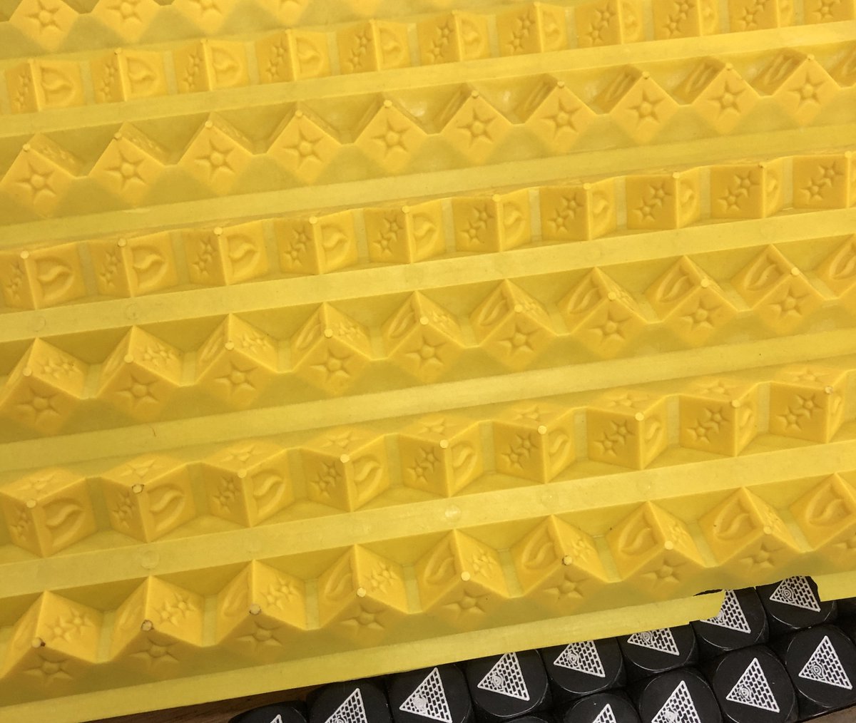 SJGames's tweet photo. Spotted while at the @madebygpi dice factory in China yesterday: New Car Wars Sixth Edition dice at early stages in the process. I love dice! -PR https://t.co/zq4qEdIPjJ