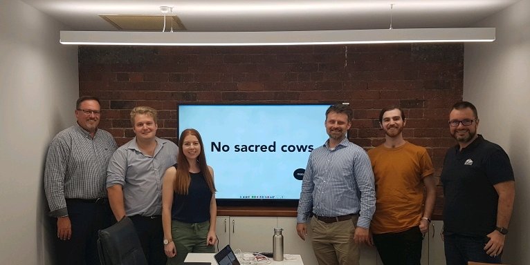 RedEyeApps's tweet photo. A big welcome to Chris, Ash, Jeremy and Matt (left to right) who joined us today in our Brisbane HQ!! Wayne and Megan paused their RedEye culture walkthrough to take a quick snap #NoSacredCows #LifeAtRedEye https://t.co/BfFh6X4mvj