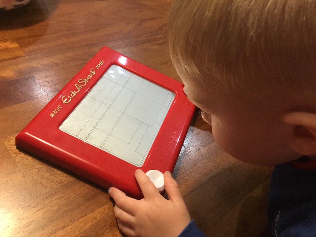 RoryToddlerLife's tweet photo. Who needs an I pad when you have an Etch A Sketch?! This has kept him much more entertained. @SpinMaster https://t.co/maW8KLHEqf