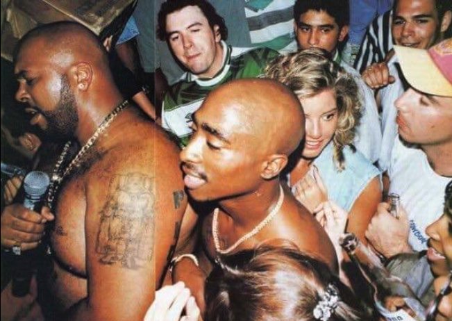 niall_mcken's tweet image. bit late on this but i've finally decided my mood for 2019 is "guy in a celtic top at a party with tupac"
