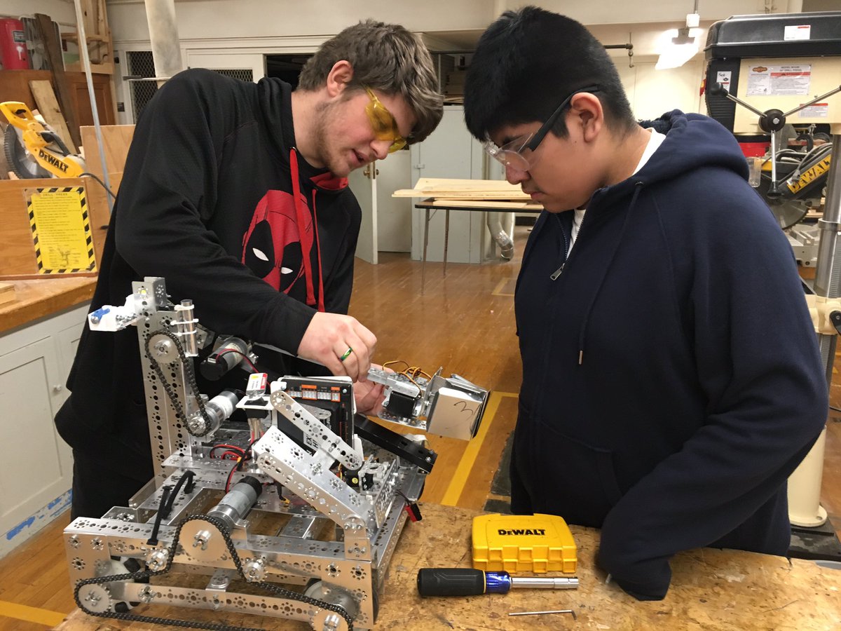Our team members are practicing for judging while our robot is preparing itself for League!