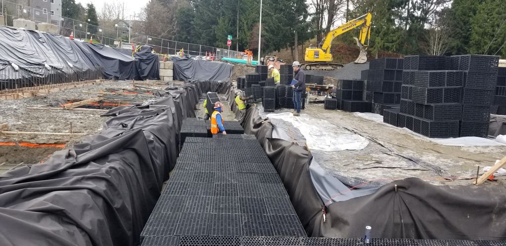 acfwestinc's tweet photo. Multi-unit apartment building in Everett, WA had a challenge with limited space for stormwater detention. R-Tank modular units provided a solution that conforms with site constraints. JMZ Contractors installed 280 double units in a lined system. 95% Void space #rtank #acfwestinc https://t.co/6IZFjK08V7