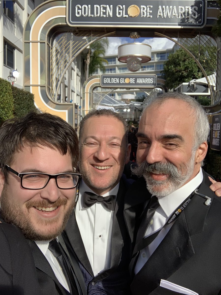 It's all business on the <a href="/goldenglobes/">Golden Globes</a> red carpet. But seriously, I owe everything to the two gentlemen on the left of this photo. There would be no social coverage at the Globes without <a href="/GungaDin/">Matt Smith</a> and <a href="/amayamario/">Mario Amaya</a>.