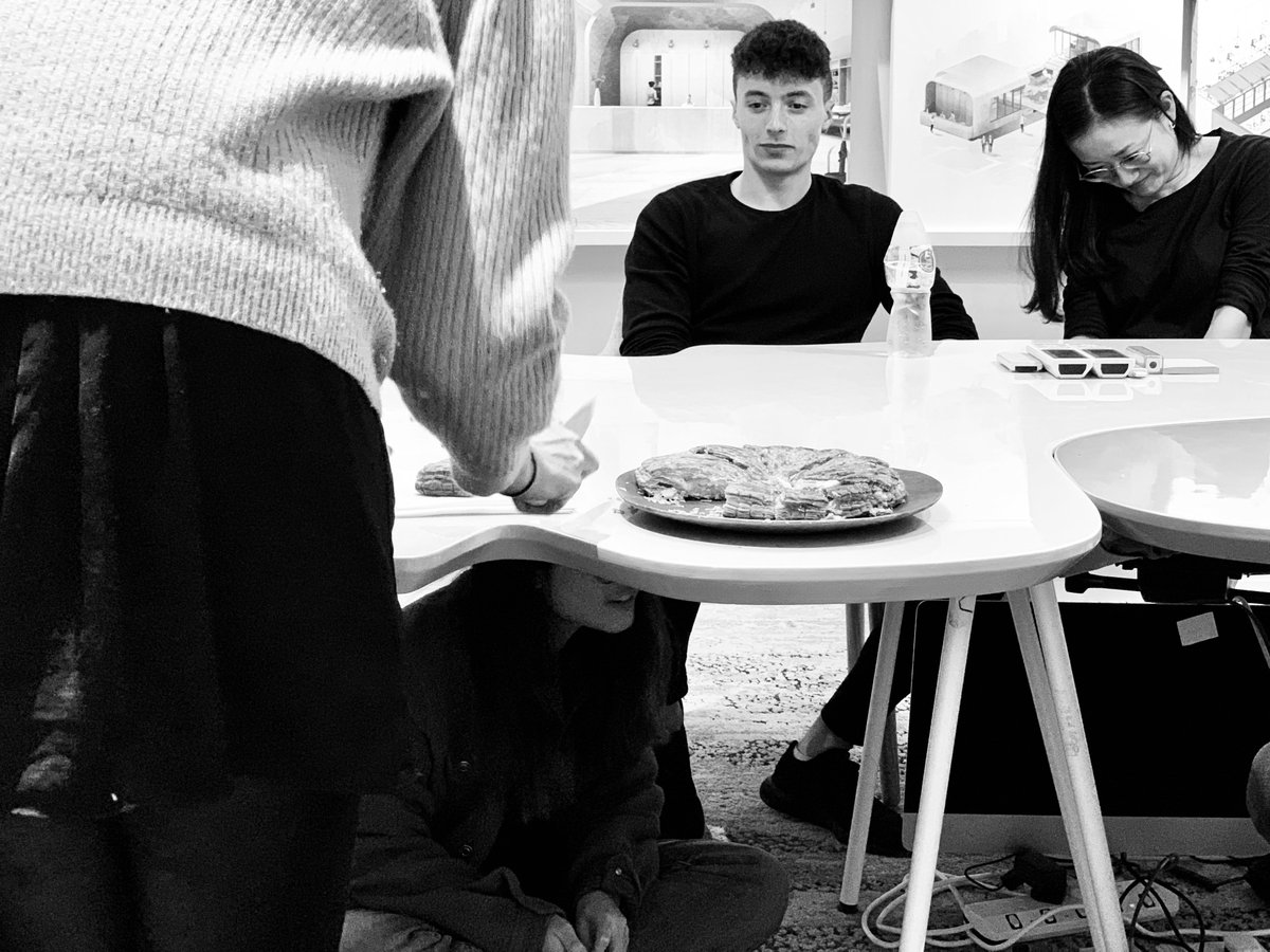 beanburo's tweet photo. Celebrating La Galette des Rois (The French King Cake): The youngest person hid under the table to name which slice of cake would go to which person, and the person who found the figurine was crowned king! 🤴😂 https://t.co/az2kJ2VSGw