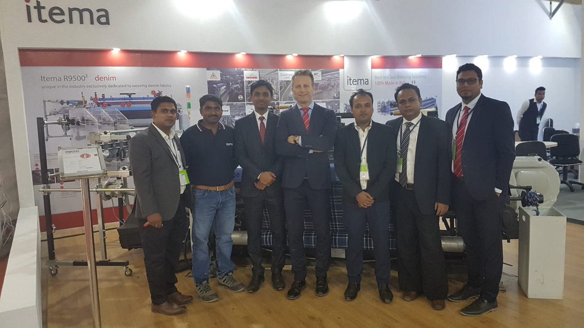 ItemaGroup's tweet photo. Greetings from Dhaka, Bangladesh, where the #ItemaDreamTeam is attending DTG-Dhaka Int'l Textile & Garment Machinery Exhibition. If there, make sure to stop at the Itema stand in Hall 7 - Stand 510 to see running live the Itema rapier #R9500. #ItemaRocks #ItemaFamily #DTG https://t.co/XfcNY99rfg