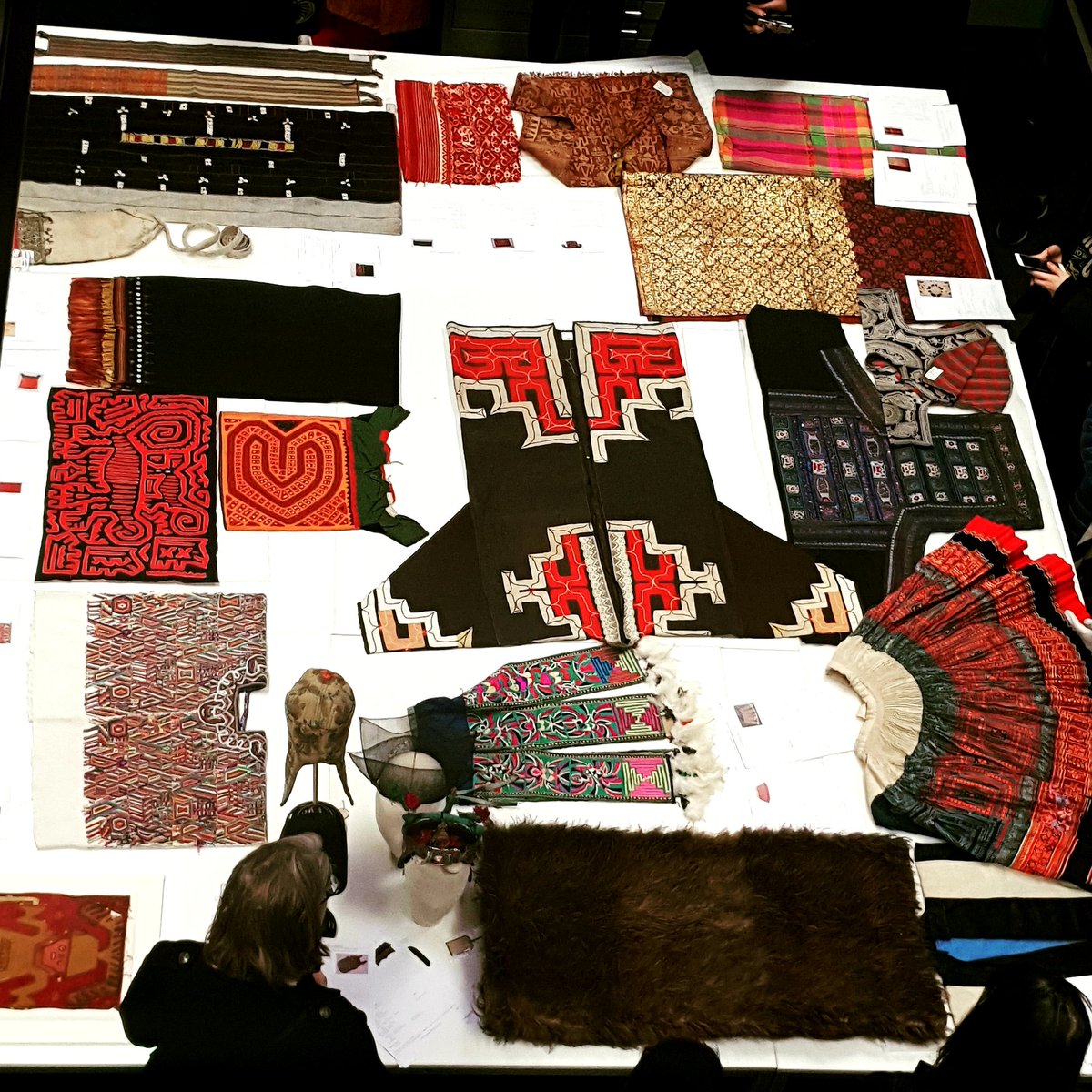 Sneak peak of the research room over the balcony- lots going on today! #officeperks #textiles #museumresearch