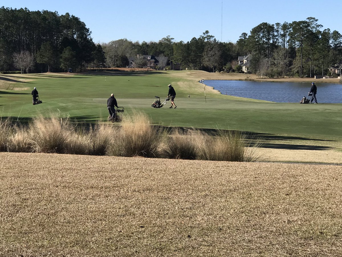 SQCCAgronomy's tweet photo. Crew getting after it today walk mowing approaches. Course is still to wet to put any riding equipment out. Hopefully tomorrow we can get a few more areas mowed. https://t.co/4mriYSzAsm