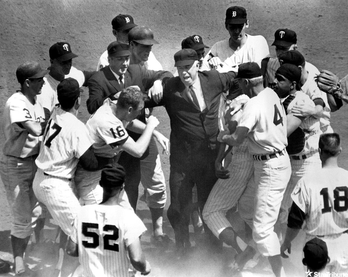 Umpire John Flaherty separates Detroit Tigers pitcher Phil Regan (16) and Minnesota Twins first baseman Vic Power, right, partially hidden, during the fifth inning on June 28, 1963 at Metropolitan Stadium. Power was ejected. (John Croft/Star Tribune) @tigers @Twins @StribSports