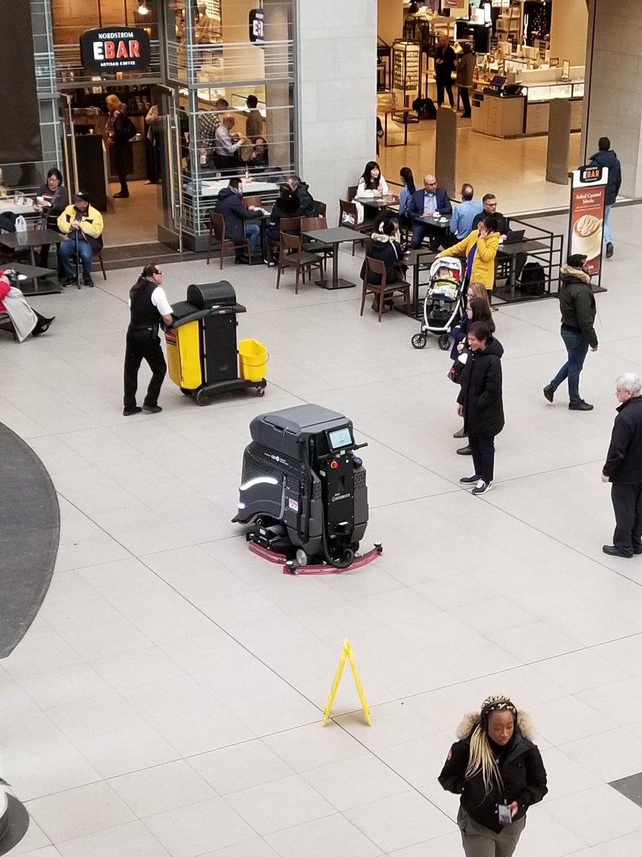 I saw someone else post about it awhile ago ... but this is the first time ive seen our buildings robot cleaners in action