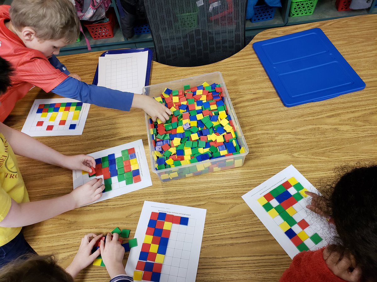 Principal_LSES's tweet photo. Second graders in Ms. Strickland's class working on symmetry during Math. Four stations asking students to design symmetrical patterns in differing colors and shapes. @TuckPrinc @APSMath @2ndgradesliders @APSVirginia @APSVaSchoolBd #TuckahoeRocks https://t.co/LjCSMQfOH0