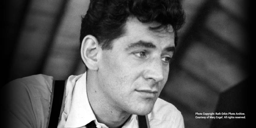 This week we're featuring photos of <a href="/LennyBernstein/">Leonard Bernstein</a> by Ruth Orkin! Here he is in the 1940s: a young man and budding musician at <a href="/TanglewoodMA/">Tanglewood</a>.

📷 Copyright: Orkin Photo Archive. Used by permission, courtesy of Mary Engel. All rights reserved. See more: bit.ly/orkin-lenny