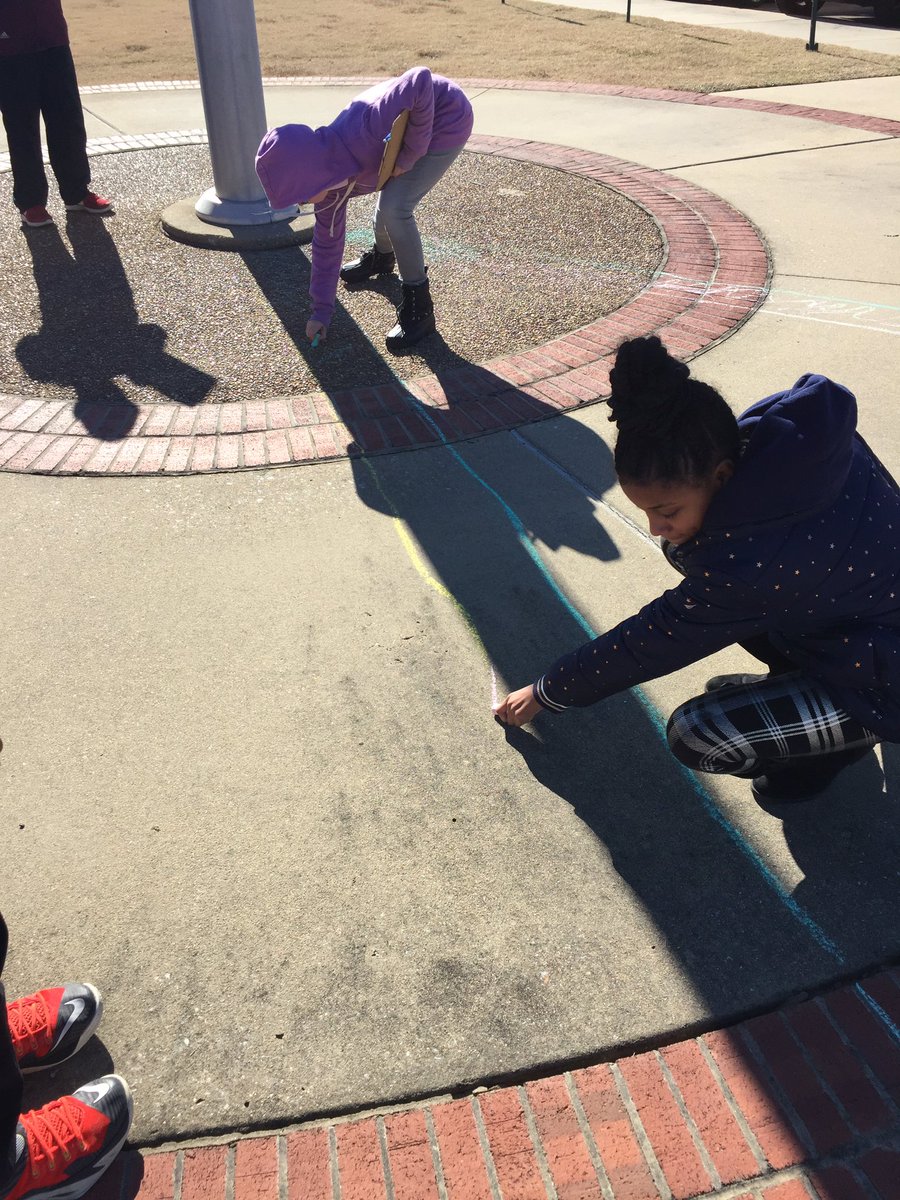 KimGlover9's tweet photo. Using the school flagpole, we tracked shadows throughout the day noting how the shadow changed as the Sun appeared to move across the sky. We also used our observations to determine which direction is North. @TweetDCS_OES #RaiseTheBar #beAwesome https://t.co/bOhOmyvbOv