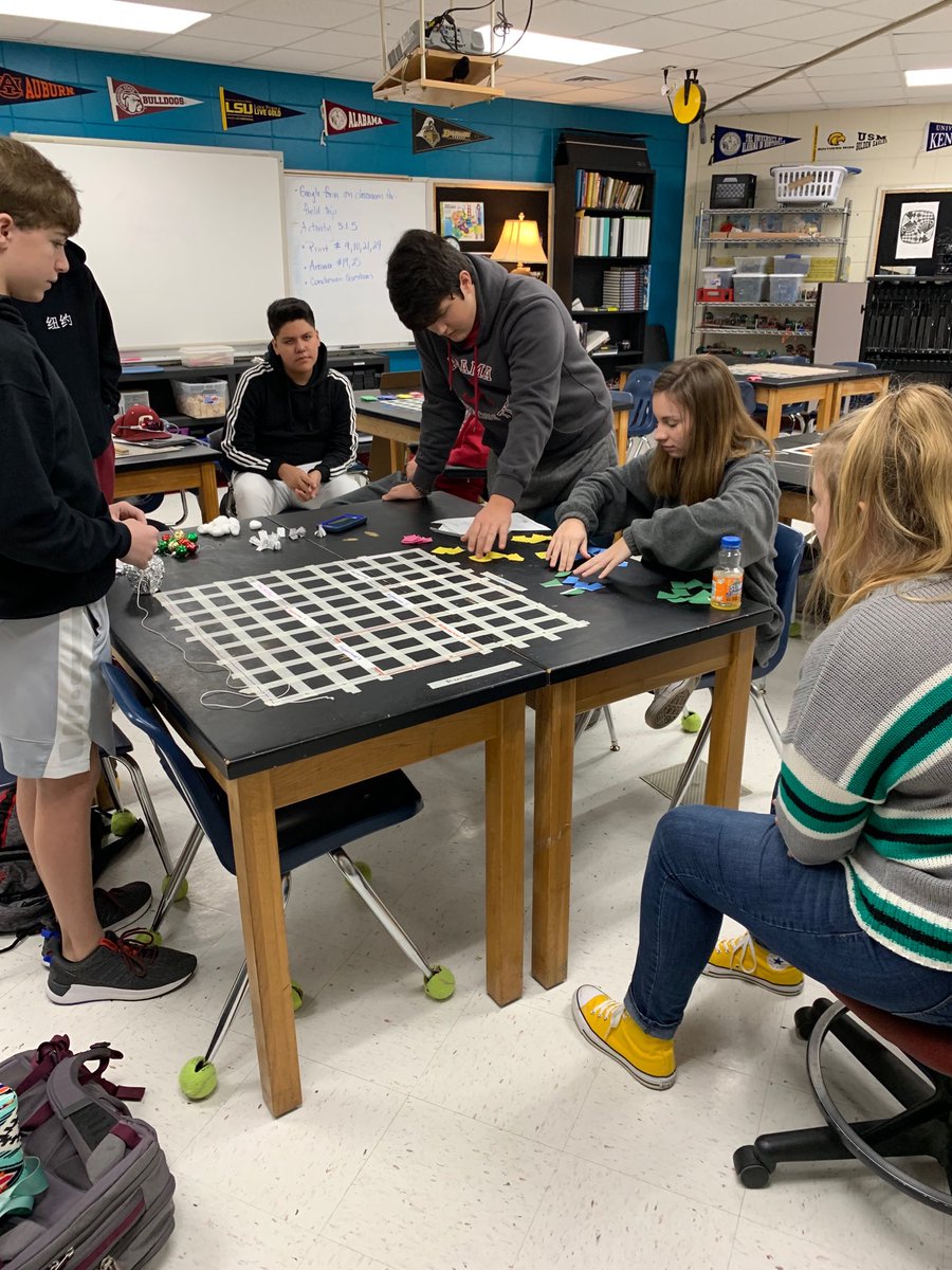 cobracrew's tweet photo. Engineering students creating and testing a communication and delivery system made only of 4 color cards. They had to fill orders and make deliveries without using verbal commands. So fun! @GHSCareerTech #PLTWIED https://t.co/WTqv7ZPrqC