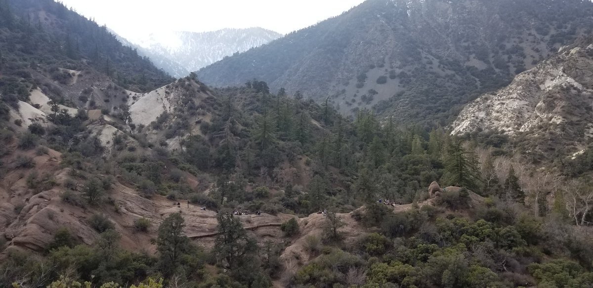GeneseoGeology's tweet photo. Geneseo Geology students hiking along the saddle on the way to Devil's Punch bowl. Those specks on the reddish rock (low center) are students. #geneseogeology https://t.co/JPOAraImNu