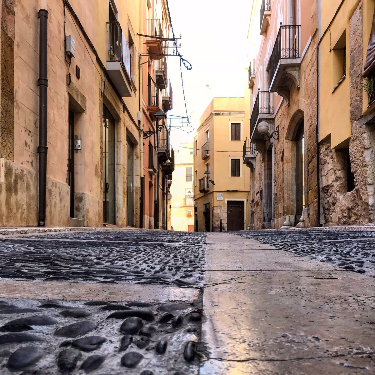 heart_bcn's tweet photo. The gorgeous pebbled streets of Tarragona.. around an hour on the train from Barcelona.. it’s a really great day trip with lots of fabulous things to see!  It’s one of my favourite trips! #Tarragona https://t.co/Z8PRhO05Vh