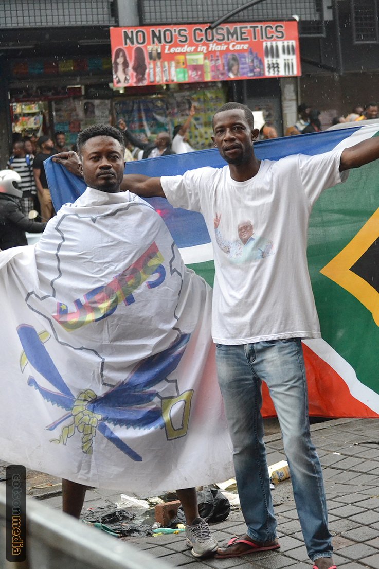 CollinsNyamadza's tweet image. Scenes out of #Yeoville #Johannesburg as celebrations for #CongoElection #CongoElections #DRC #Congo  continue. Ecstatic #Congolese brothers and sisters defying the rain. @caxmag @ewnupdates @CNNAfrica @SABCNewsOnline @BBCAfrica @Radio702 @dailysunsa