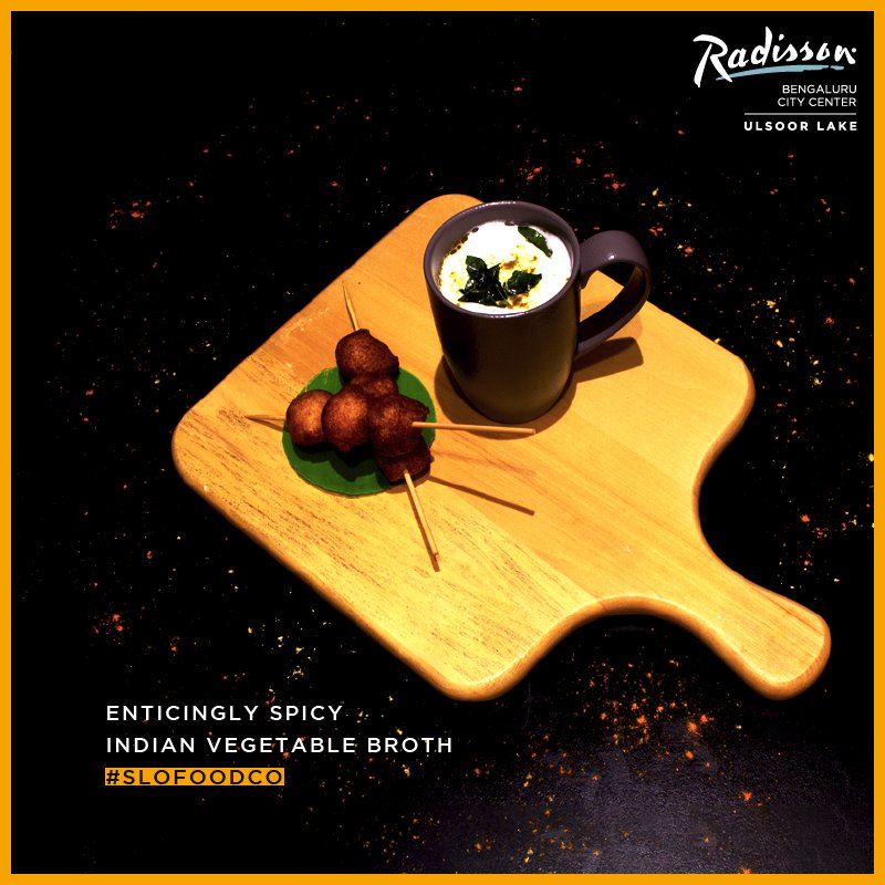 SloFoodCo's tweet photo. Enjoy a Sunday Afternoon with our special Spicy Indian Vegetable Broth topped up with Double Floweret Curry Foam, Served with Masala Gundpongl. #SloFood #SloFoodCo #RadissonBengaluruCityCenter #TarkariCappuccino #Bangalore #Ulsoor #hotel #restaurant #India https://t.co/lZQwwfdnp7