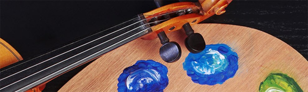 a photograph of a violin next to a paint palette
