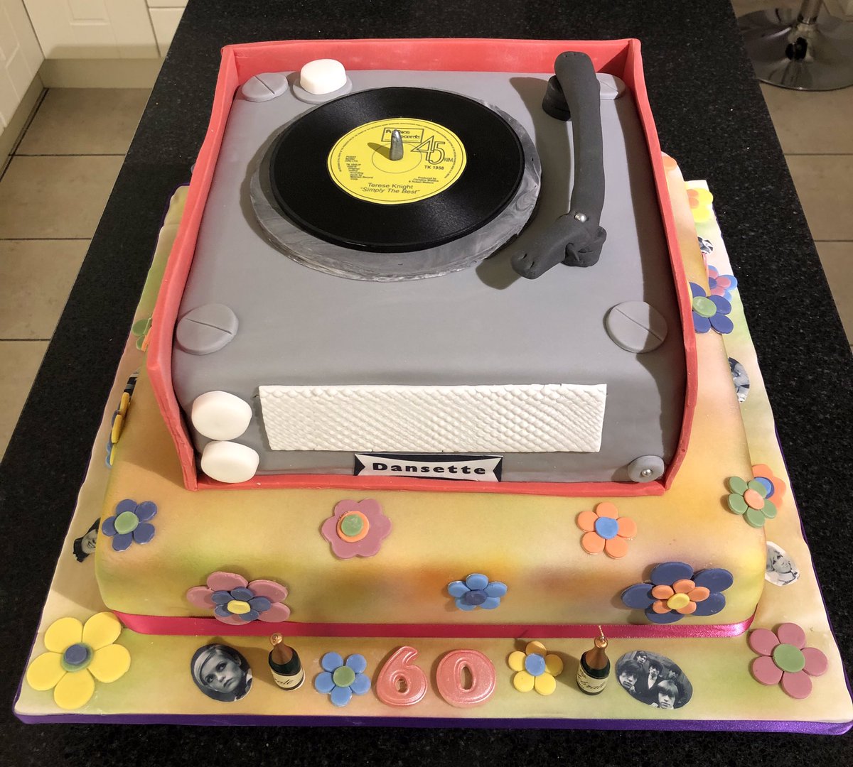 A special cake for a special friend! Top cake is a representation of a sixties Dansette record player.. took quite a while that one!! The record is completely edible!