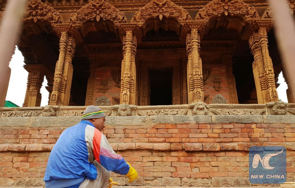 XHNews's tweet photo. Reconstruction of damaged historical, cultural monuments underway at Patan Durbar Square in Nepal's Lalitpur after devastating 2015 earthquake https://t.co/6UtlhL6wbs