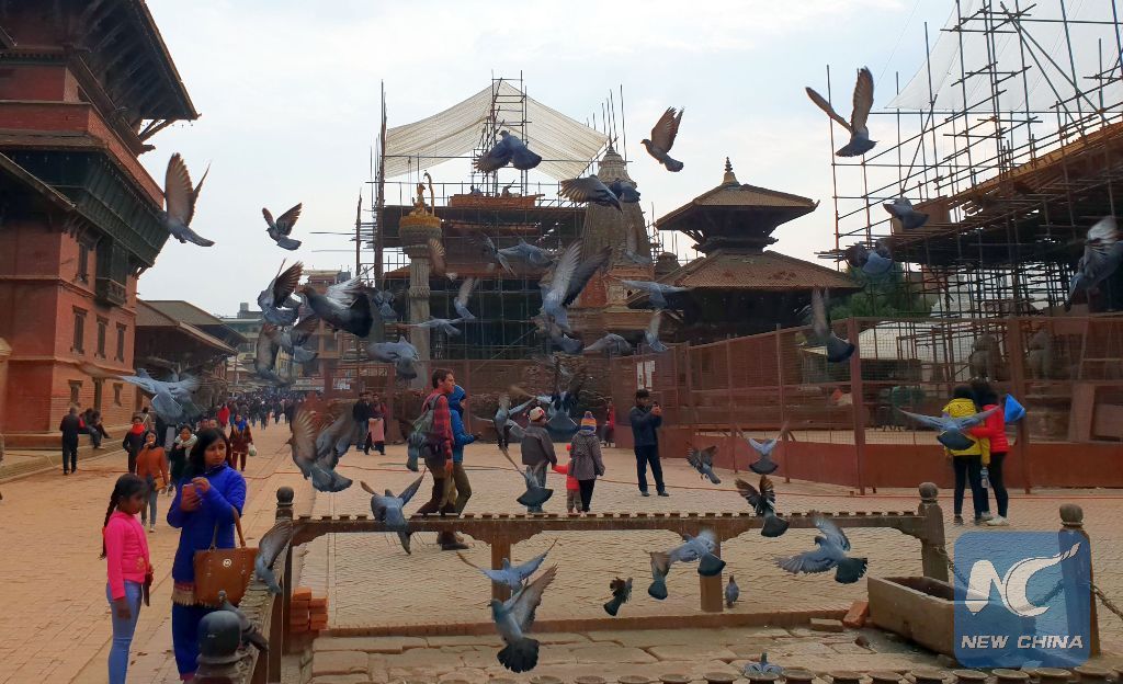 XHNews's tweet photo. Reconstruction of damaged historical, cultural monuments underway at Patan Durbar Square in Nepal's Lalitpur after devastating 2015 earthquake https://t.co/6UtlhL6wbs