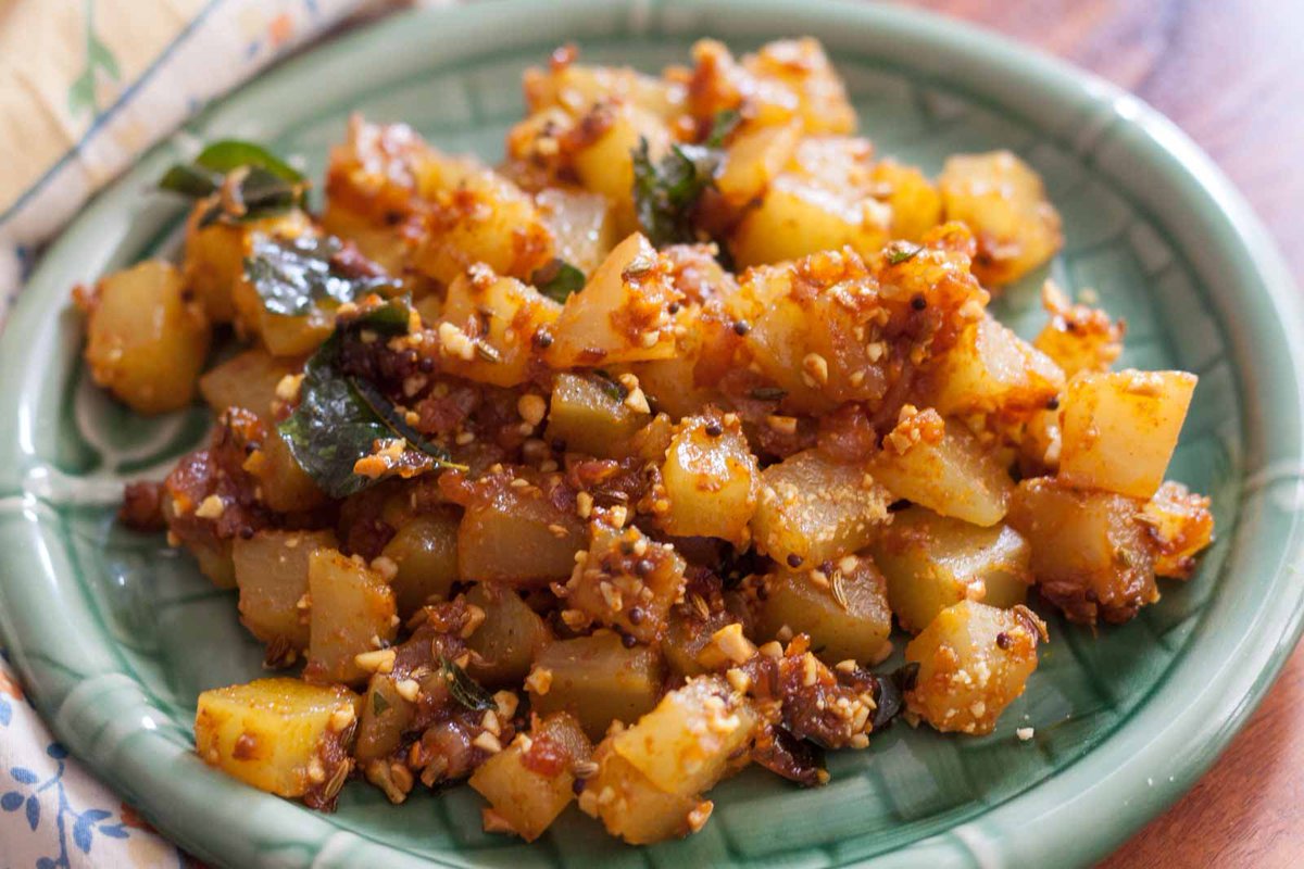 Curry in a Naan Sweet &amp; Spicy Raw Papaya Moongphali Ki Sabzi Recipe: Sweet &amp; Spicy Raw Papaya Moongphali Ki Sabzi Recipe is a mouthwatering side dish prepared like north Indian style. The raw papaya is cooked with a good amount of Indian spice that has… dlvr.it/QwRJ4h