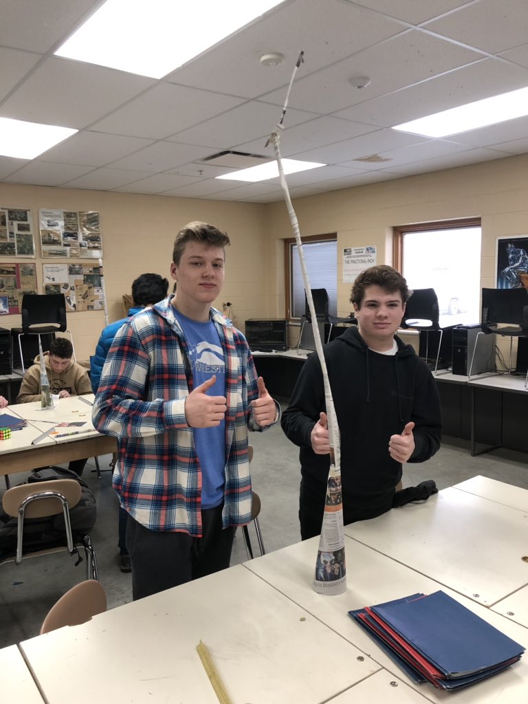 Chase and Cameron just built a freestanding paper tower 62” tall given two 14” pieces of newspaper and 12” of tape. Nice work!