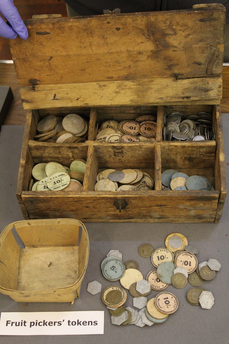 wisbechmuseum's tweet photo. It's the third day of our deep clean! We've been learning how to care for fruit picking tokens from curator Robert Bell. Take a look at these tokens from Venni's Farm in Parson Drove, #Wisbech, dating back to the early 20th Century.

#fenlandfarming https://t.co/Y3Ska3tfNC