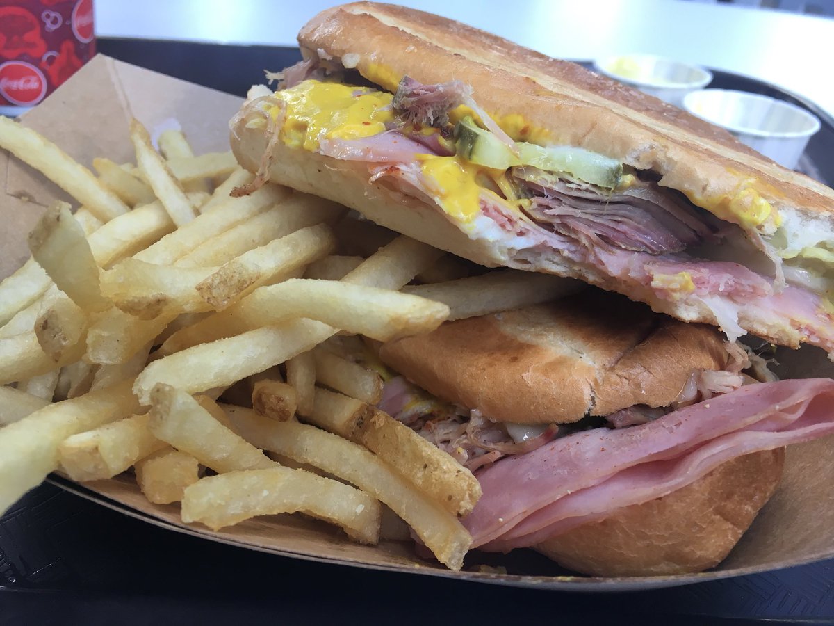 itsaustindoes's tweet photo. Decided to come try the new #BacklotExpress menu. Chickened out on the chicken and biscuits (ha). But this Cuban is delicious! I thought the pickles and mustard would be problematic since I’m not a fan of either. But they’re very tasty! @DisneyFoodBlog #HollywoodStudios #WDW https://t.co/I3hUlqsrF7