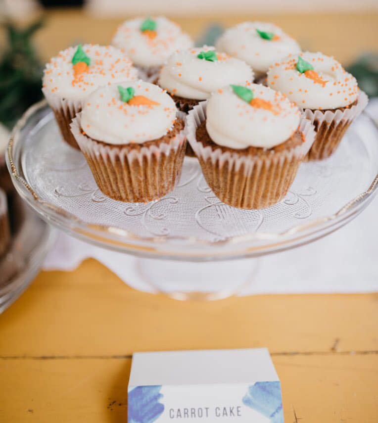 Organic carrots, Texas pecans, Golden raisins and pineapple folded into a  moist batter, baked with love, and topped with vanilla cream cheese  frosting. You know you want one! 🥕🧁😋