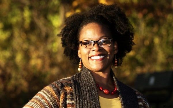 Blavity's tweet photo. Chills. A Minnesota county's first Black commissioner took her oath of office over 'The New Jim Crow' #AngelaConley https://t.co/cFXHpcmMmm https://t.co/EeCdfE8xS9