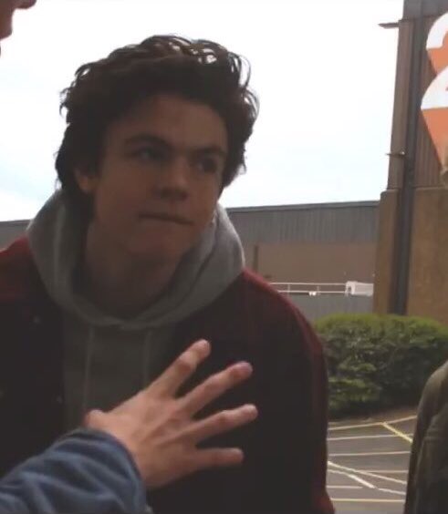 blake wearing his best piece of clothing: his maroon jacket .