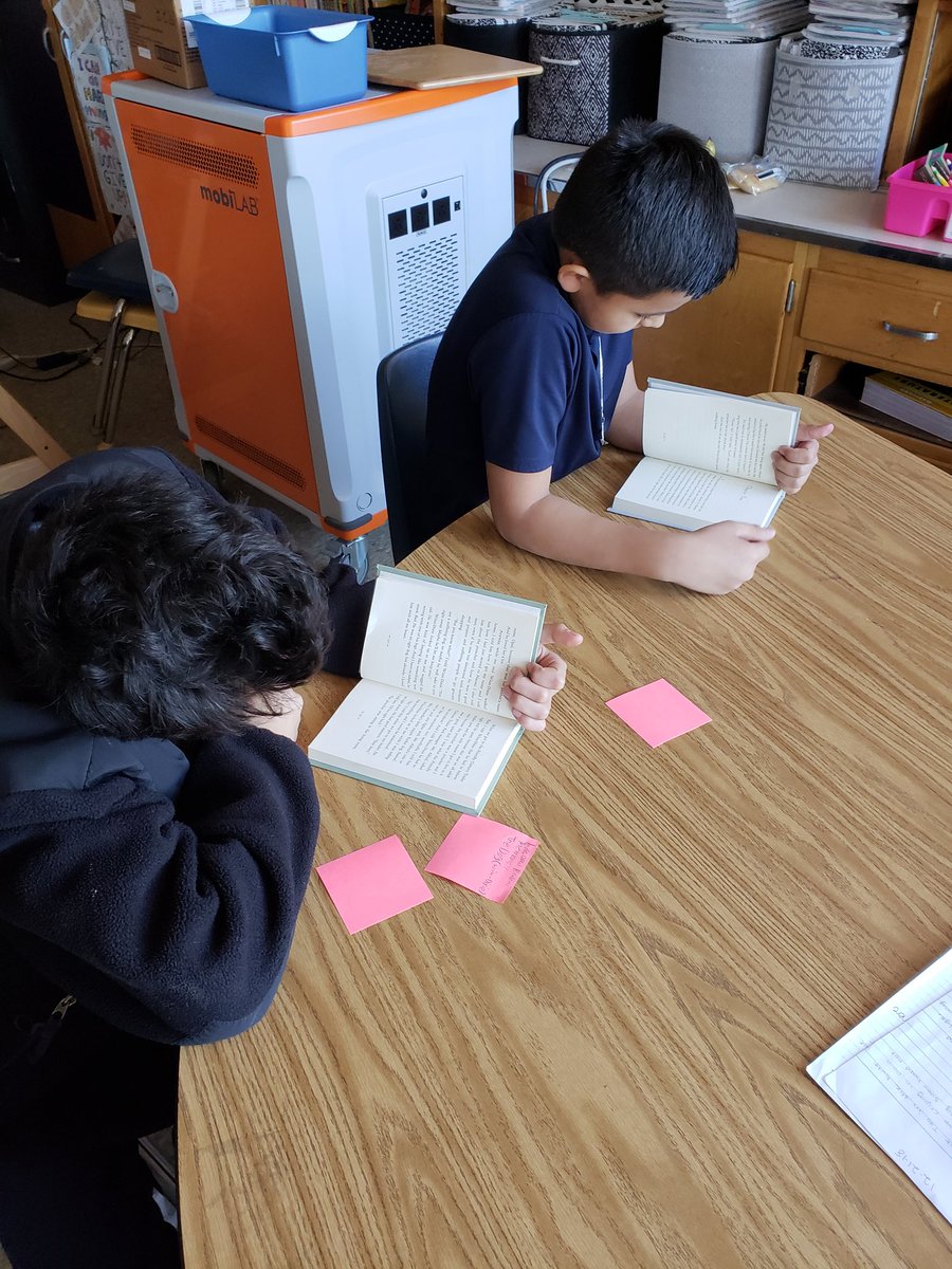 amsladc's tweet photo. @AnnapMSAACPS 6th graders reading by a cozy fire on this chilly Friday! #AACPSPowerUpRead @MrsSchlegel_AMS @AMSLibraryReads https://t.co/lySCbYIR7O