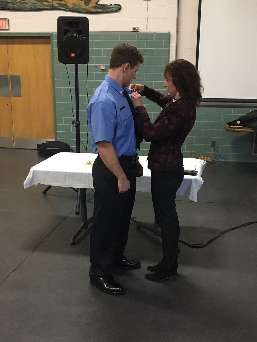 ClevelandFire's tweet image. #CLEFIRE Cadet Justin Leon is pinned by his mother, Grace Leon. The son of @CLEpolice Officer Wayne Leon, who was shot and killed  while on patrol June 25, 2000, Firefighter Leon was issued the same CFD  badge number “1338” that his father wore for CPD. #publicservice #family