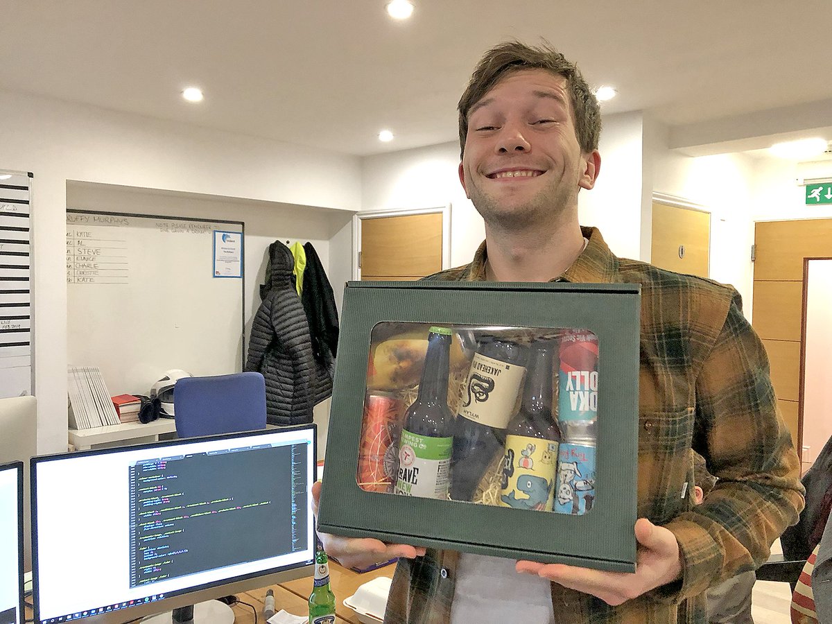 Charlie from our digital department is 27 today! Look at his happy little face. Happy birthday, Charlie! #happybirthday #presents #beer #getrefined