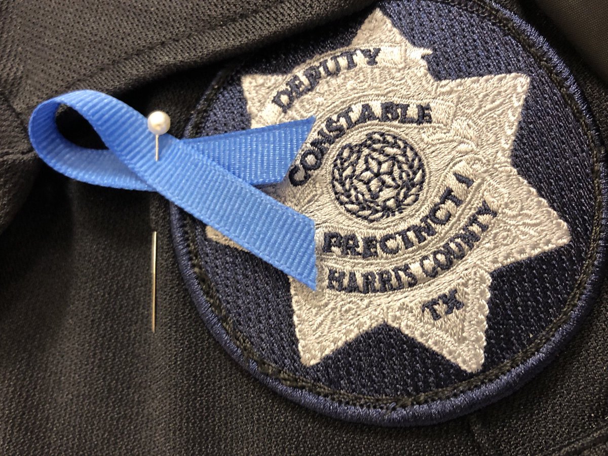 Pct1Constable's tweet photo. Deputy T.J. Sparkman is among many of our employees today wearing a blue ribbon in support of #HumanTraffickingAwarenessDay . We work every day to help those trying to escape this insidious crime. #hounews @hawctalk @SM_Hostel https://t.co/QCvUkv4KJP