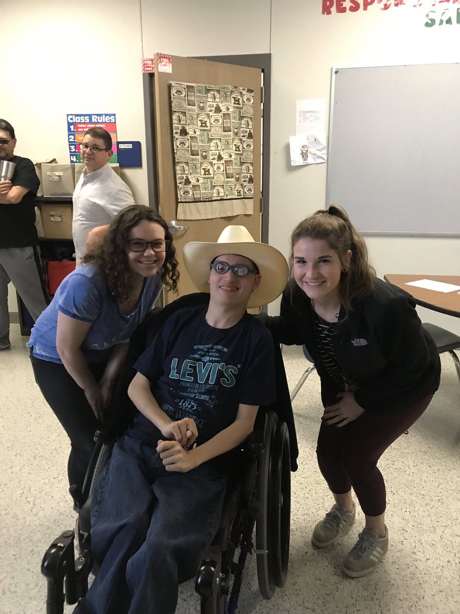 Smiling because Patrick got a new hat!