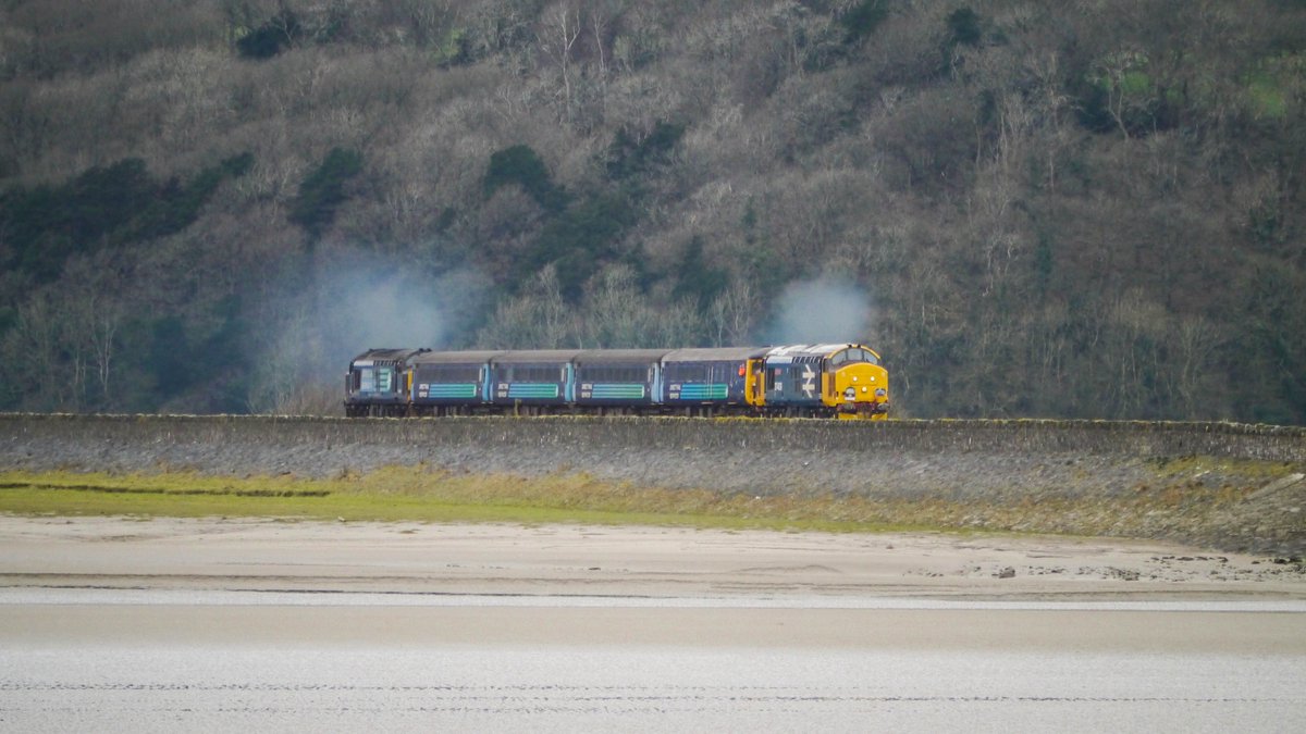 They crept up slowly approaching Arnside Viaduct and this is the moment all hell broke loose. Cumbrian 37s Farewell 37409 37425 Absolute magic.