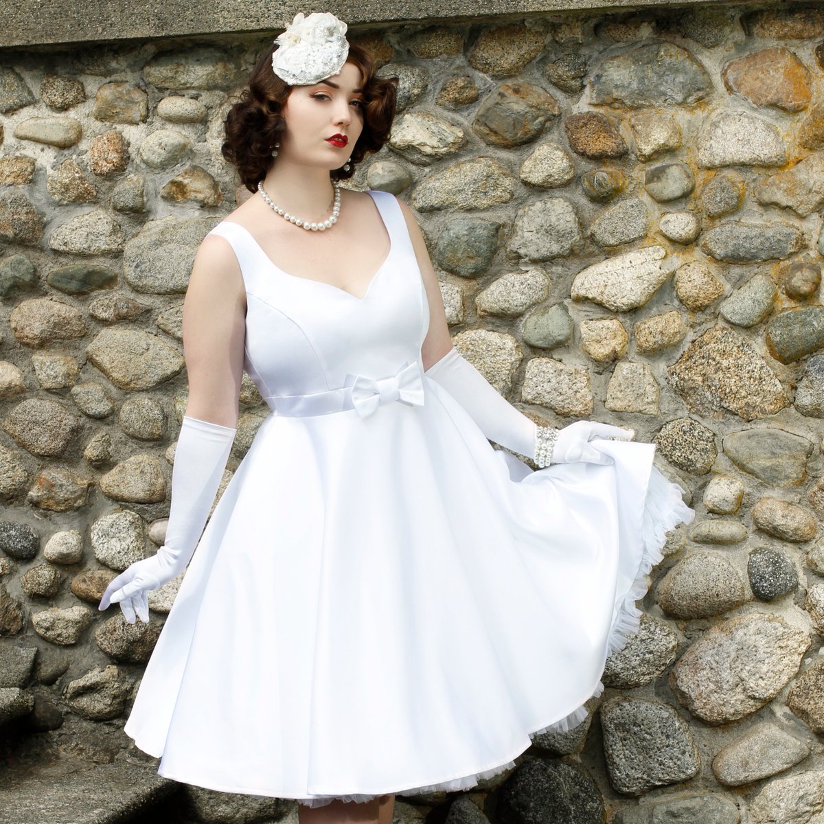 cherryvelvety's tweet photo. "Life isn't perfect - but your outfit can be."😍
Our model is perfection in the Veronica dress👗 in White Satin, available in regular &amp; #plussizes.  
#modernvintage #vintageinspired #pinup #retrostyle #madeinyvr #vintageglamour #madeincanada #pinupbride #vintagebride #retrobride https://t.co/uLnF8X2A5j
