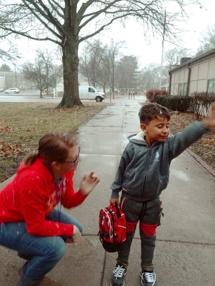 krisculby's tweet photo. I realized our new student, being from Cuba, might never have seen snow. Took him outside and he ran around trying to catch the large flakes with his tongue as he grinned from ear to ear. Photo doesn’t adequately depict his joy! @FortOsageSchool #BUimpact #firstsnow #arted https://t.co/VqaRpMUC2g