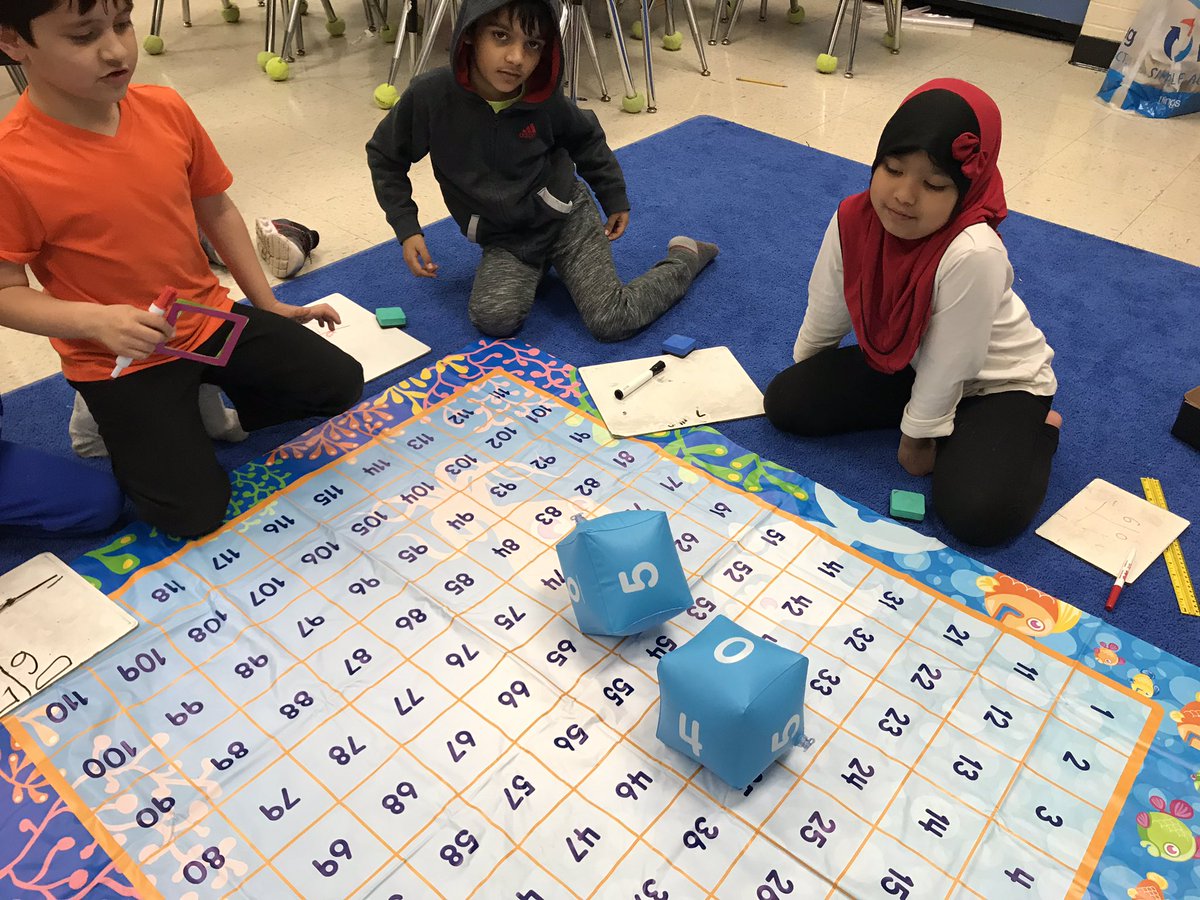 McCharm99's tweet image. Shoes off, and we’re making 2 digit subtraction with regrouping review FUN during Success Club. #noworksheetstoday #buildingmathematicians #mathrocks @NISDElemMath @NISDCNE