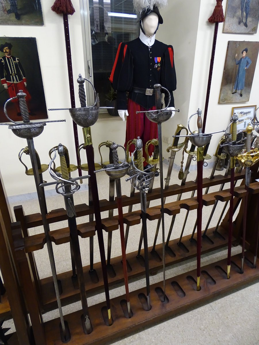 The various Officers' & Sergeants swords used over the centuries by the Swiss Guard to protect the Papacy. Many were used in the various wars embroiling Rome in the period from the Renaissance to the Italian unification wars in the 19th century. All made in Austria or Germany