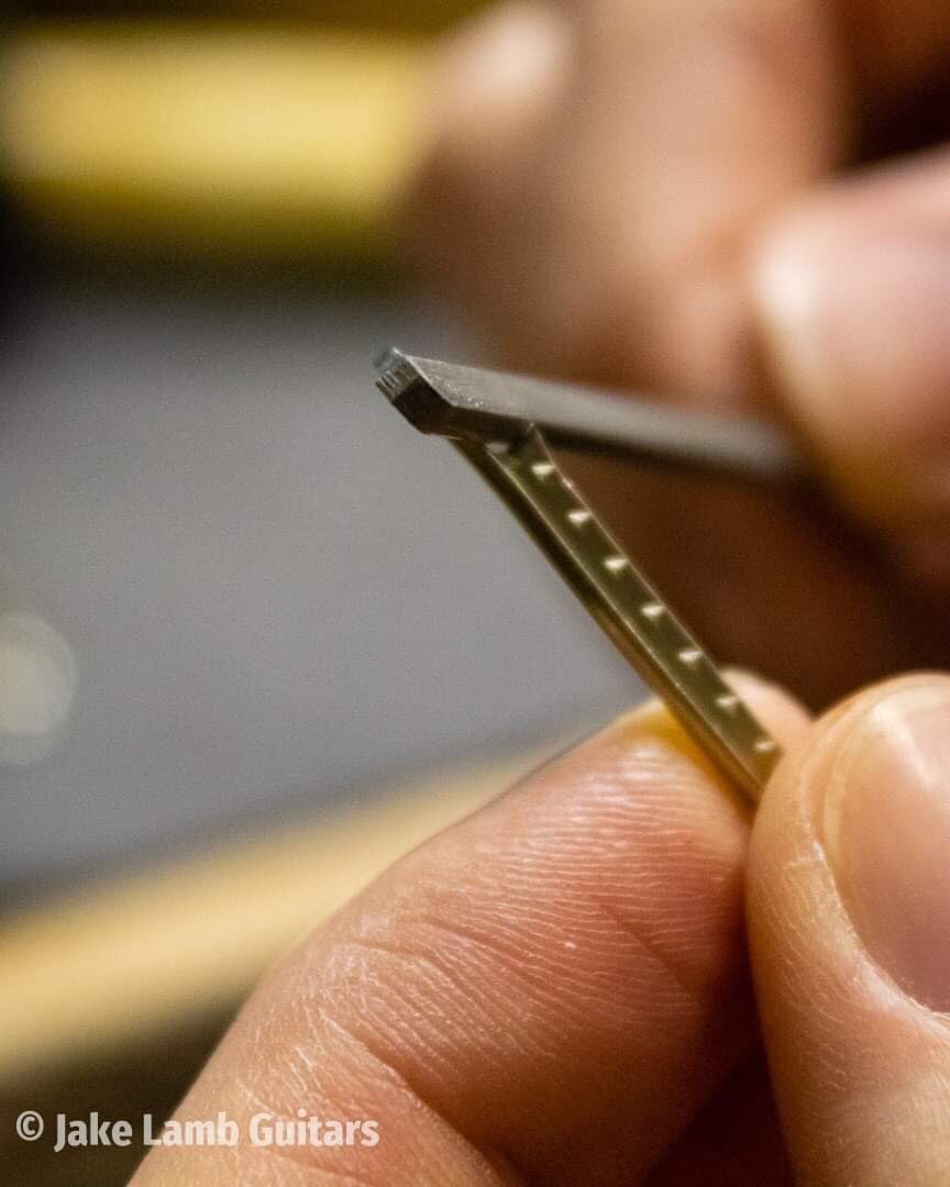 jakelamb94's tweet photo. This is why a refret for a bound fretboard takes up more time. 👌🏼 #jakelambguitars #luthier #guitarrepair #guitarmaker #milnthorpe #cumbria #lakedistrict #lancashire #canon #photography #refret #filing #woodwork #metalwork #workshop https://t.co/KUQySdSo0Z