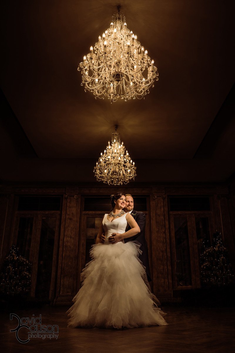 I love this picture from Cat and Dom's wedding at Fawsley Hall Hotel this December. For more photos from their big day follow the link below. #fawsleyhallhotel #wedding #weddingdress #chandelier #weddingphotographer #decemberwedding